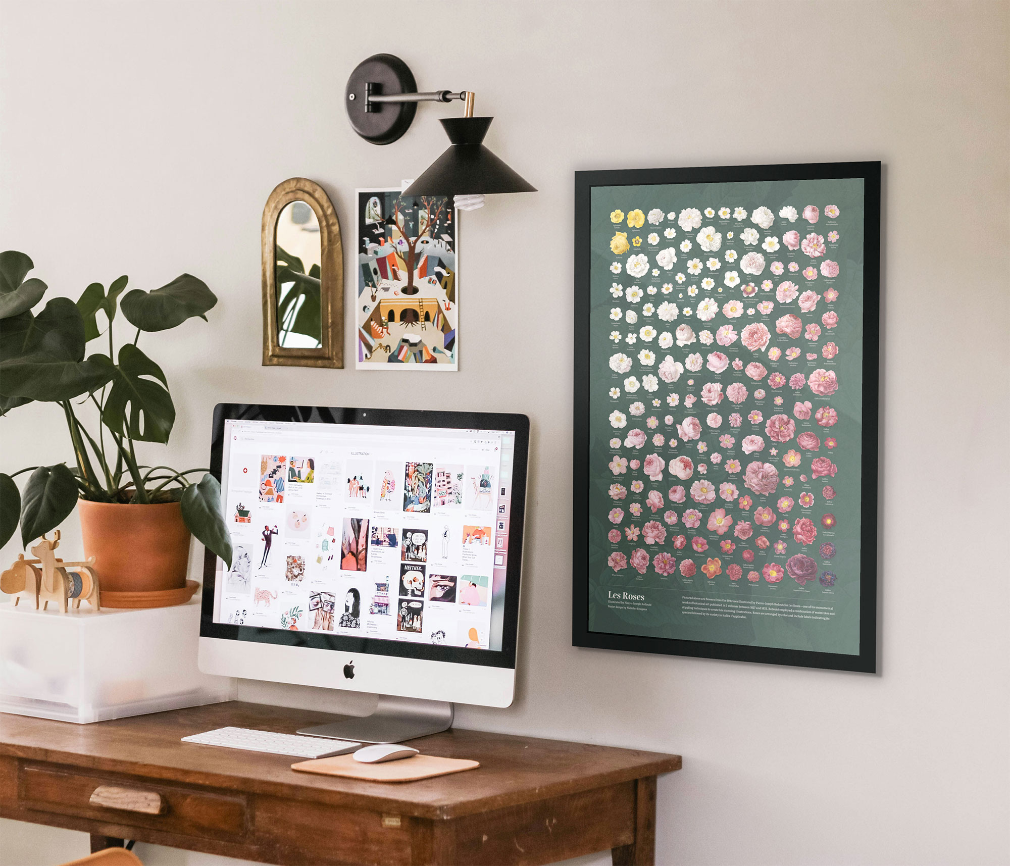 Photo of a home office with framed roses poster hanging on the wall